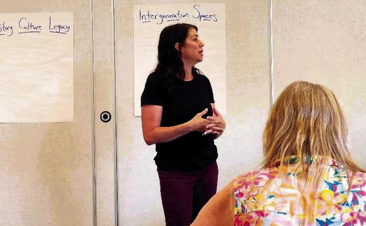 Valley First Executive Director Misty Sprague explains what subjects the organization is needing input from the focus group on. Photo by Shirley Pigg
