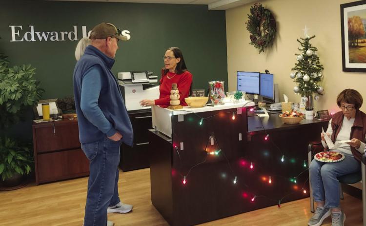 Nicole Hamler greeted clients at the Edward Jones Holiday Open House Photo by Shirley Pigg