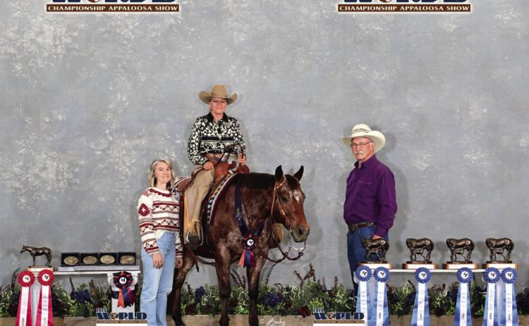Cindy Schafer, pictured with daughter Ellisha Warner of Gibbons, Alberta, Canada and spouse Richard Schafer, and her mare, Bugs, won big at the Appaloosa World Show in Texas. Courtesy Photo