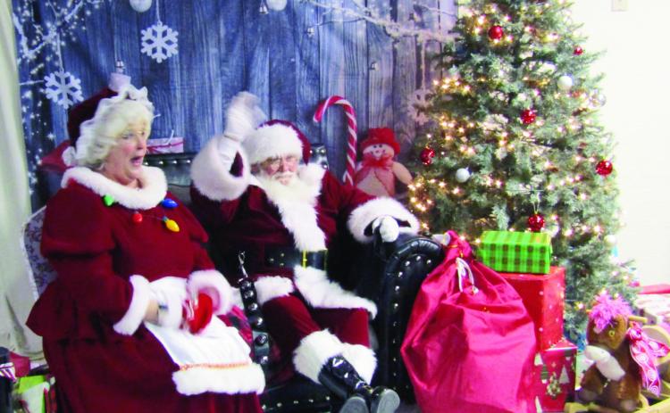 Mr. &amp; Mrs. Claus took time out to greet youngsters at the Colorado City Rec Center following the parade on Saturday evening. Photo by Shirley Pigg
