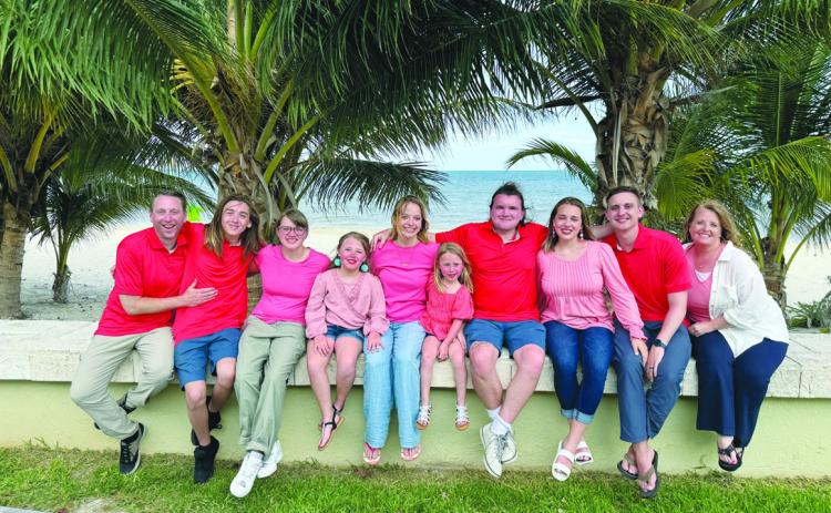 New Rye High School Principal Matt Dejong (L) and wife, Lisa (R), with their family while vacationing in Cancun. Courtesy Photo