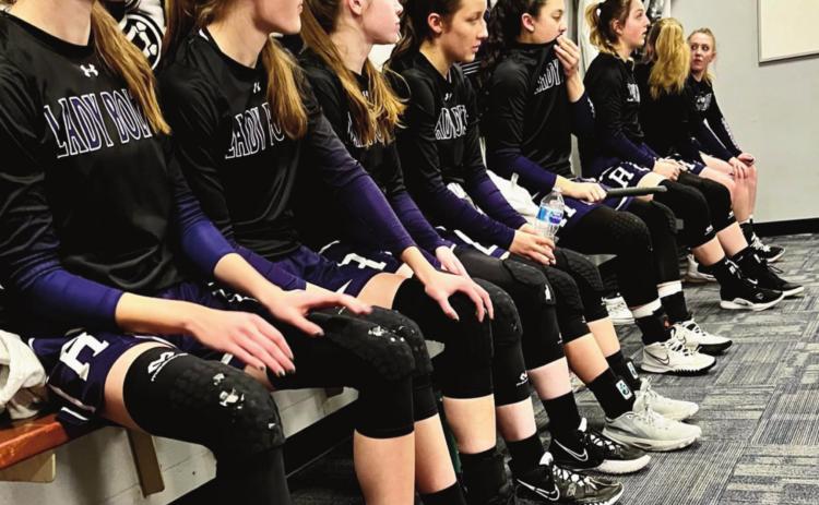 The Rye High School girls basketball team gets last minute instructions from Head Coach Kermit Spencer before a 2A State high school game Photo by Diane Elarton