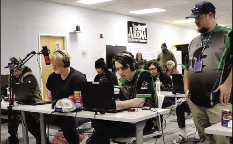 Coaches Spencer and Scott Elliot have pioneered a program that is leading to big money scholarships and a notable improvement in academic engagement and outcomes. Courtesy Photo