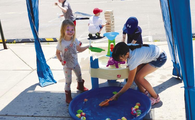 Participants of the Summer Reading Kickoff Party enjoyed games and lunch before selecting books to read Photo by Shirley Pigg