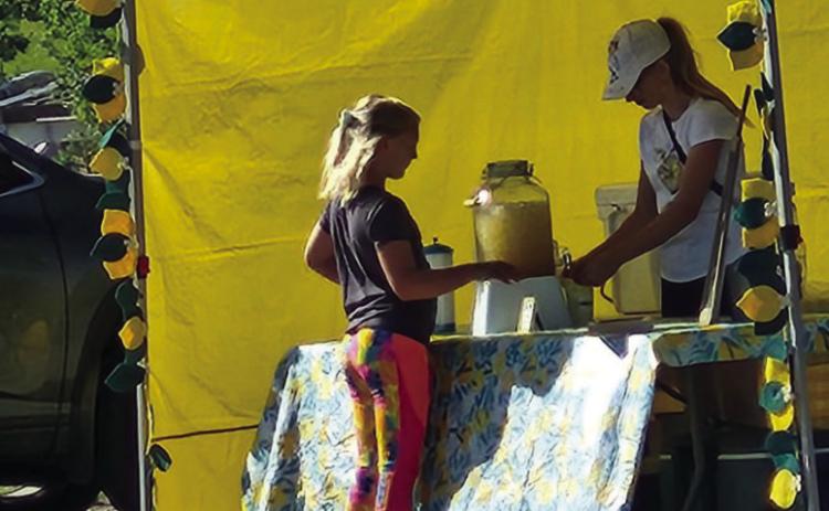 Ice cold lemonade was a big hit at the Rueben Espinoza Fishing Derby as temperatures rose on Saturday. Photo by Shirley Pigg
