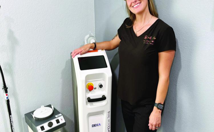 Owner/Operator Brandi Olson introduces Co2 Laser therapy availability to her clients. Courtesy Photo