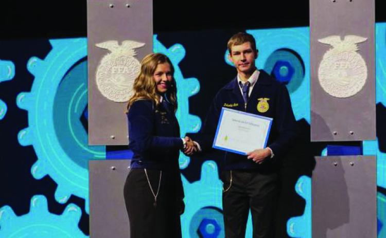 Zeb Laca, Rye High School, receives American FFA Degree. Courtesy Photo