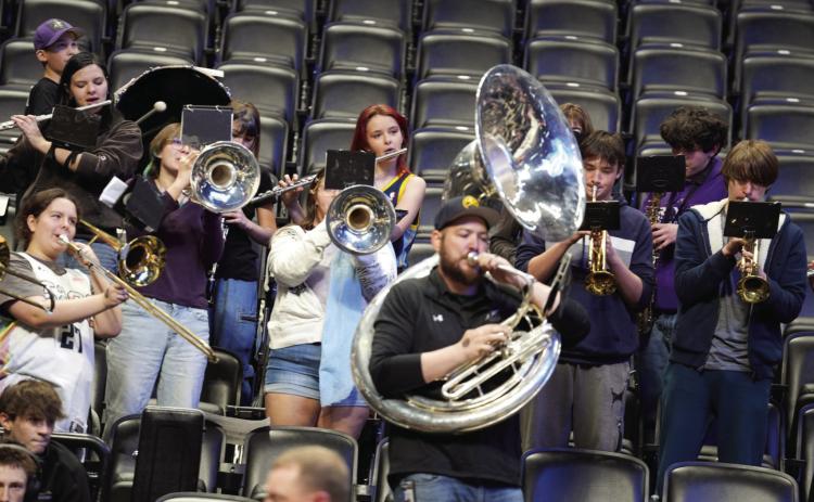 RHS boys and girls basketball teams and the RHS band got to play in Denver before the Nuggets game. A portion of the ticket proceeds went to RHS. See additional info on p. 9 Courtesy Photo