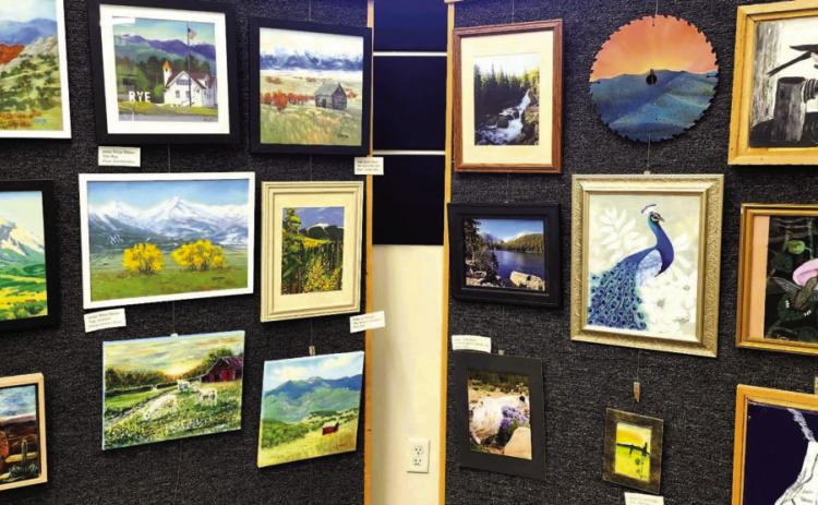 Seven local artists exhibited their work in the first rotating art show at Greenhorn Library. Photo by Shirley Pigg