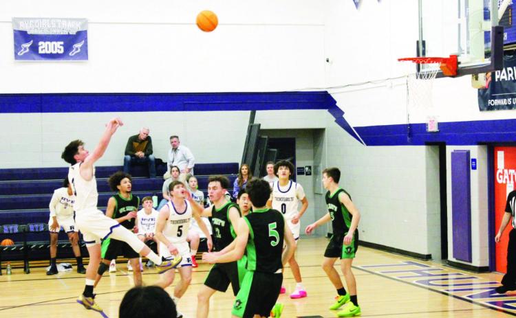 Jay Graham scores a basket against St. Mary’s. Photo by Sofia Crosson