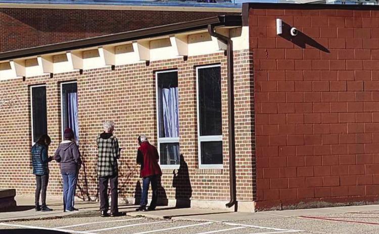 Jericho Walk participants gathered at a corner of Rye High School to offer prayers. Photo by Shirley Pigg