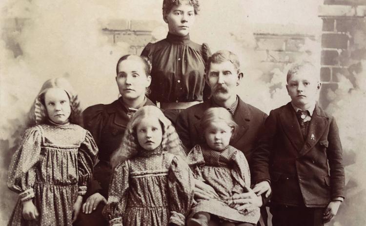 Samuel and Mary Mills Family ( Unidentied standing ) Mary, Samuel, Lillie, Clara, Samuel O, James R. Courtesy Photo