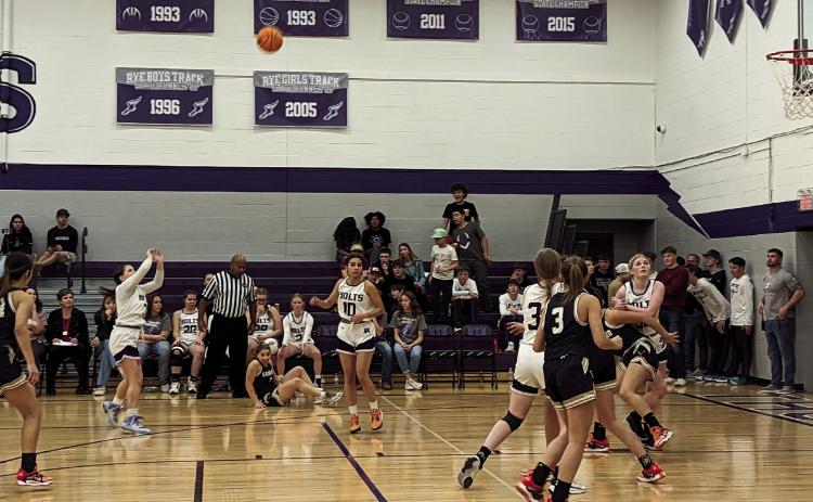 Rye High’s Gracie Briggs (#30 ) takes a long shot against Vanguard on Saturday. Photo by Deb Straub