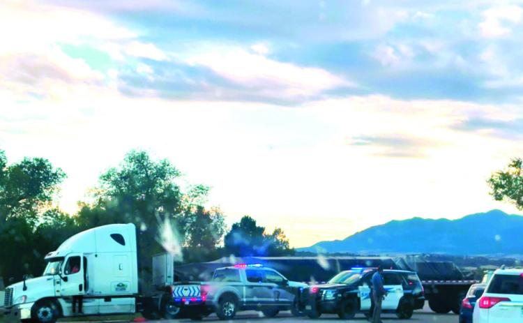 At approximately 5:45 p.m. on October 9, a semi truck became stuck across Hwy 165 while attempting to turn around at the Applewood entrance Courtesy Photo